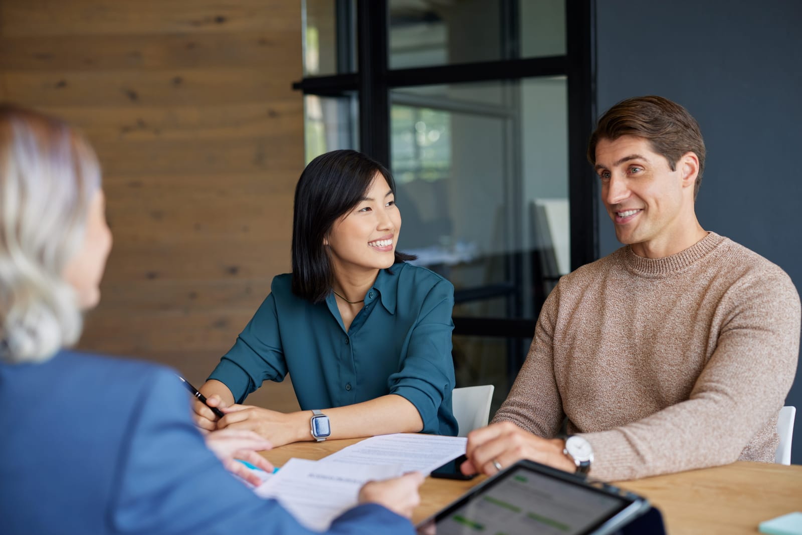 An adviser and client reviewing investment options